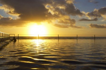 Sunset over a pool