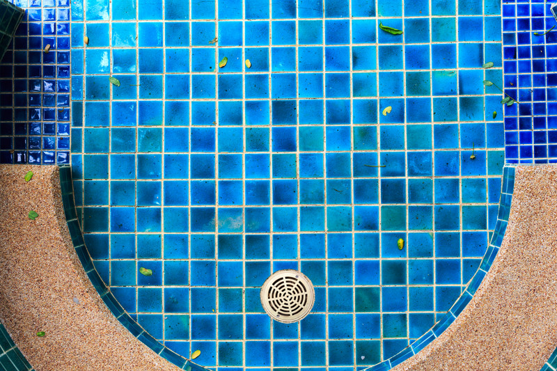 Tiled empty swimming pool