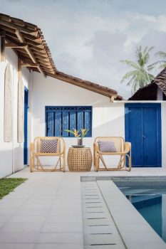 House with pool and chairs