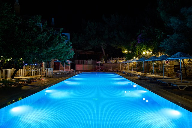 Swimming pool with underwater pool lights (LED)