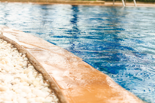 overflowing swimming pool water