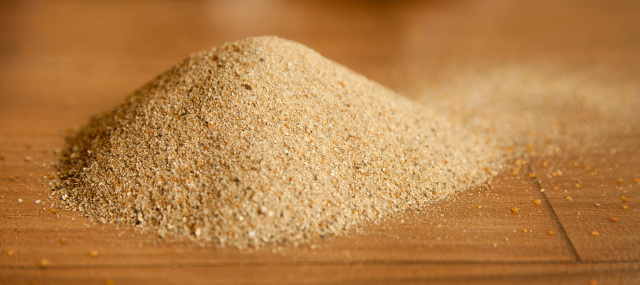 Filter sand on a wooden table.