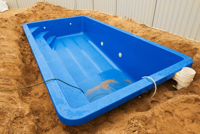 fiberglass pool under construction