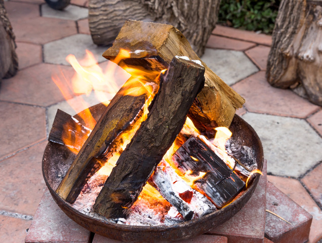 Backyard fire pit for heating