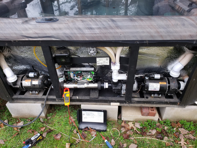 Internal components of the hot tub include the blower, heater, pump, and breaker board.