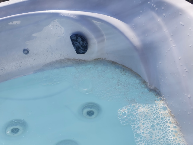 Close up view of a biofilm in the hot tub or spa