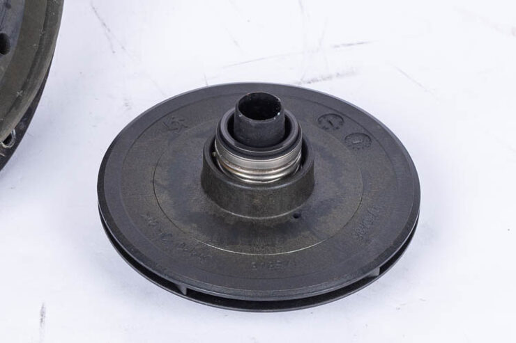Pool pump impeller. Shows the pump shaft seal with spring.