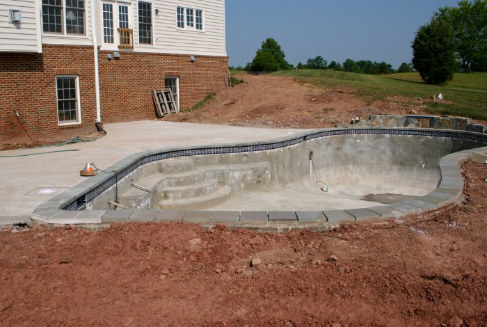 concrete inground pool nearly finished construction